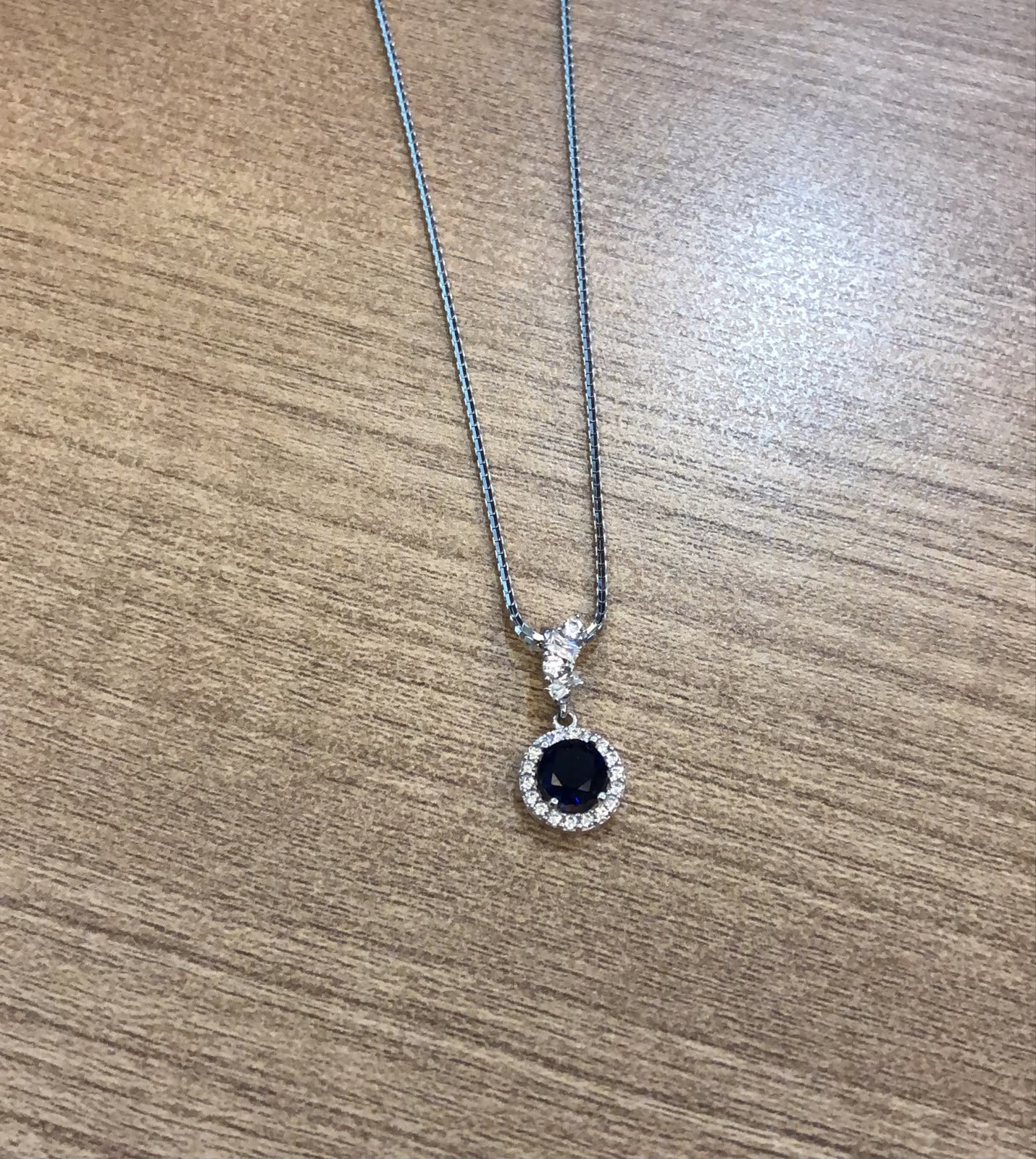 AYU round halo royalty pendant royal blue 17k white gold